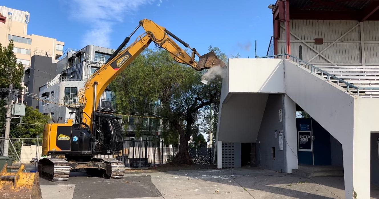 house demolition preparation excavator residential site